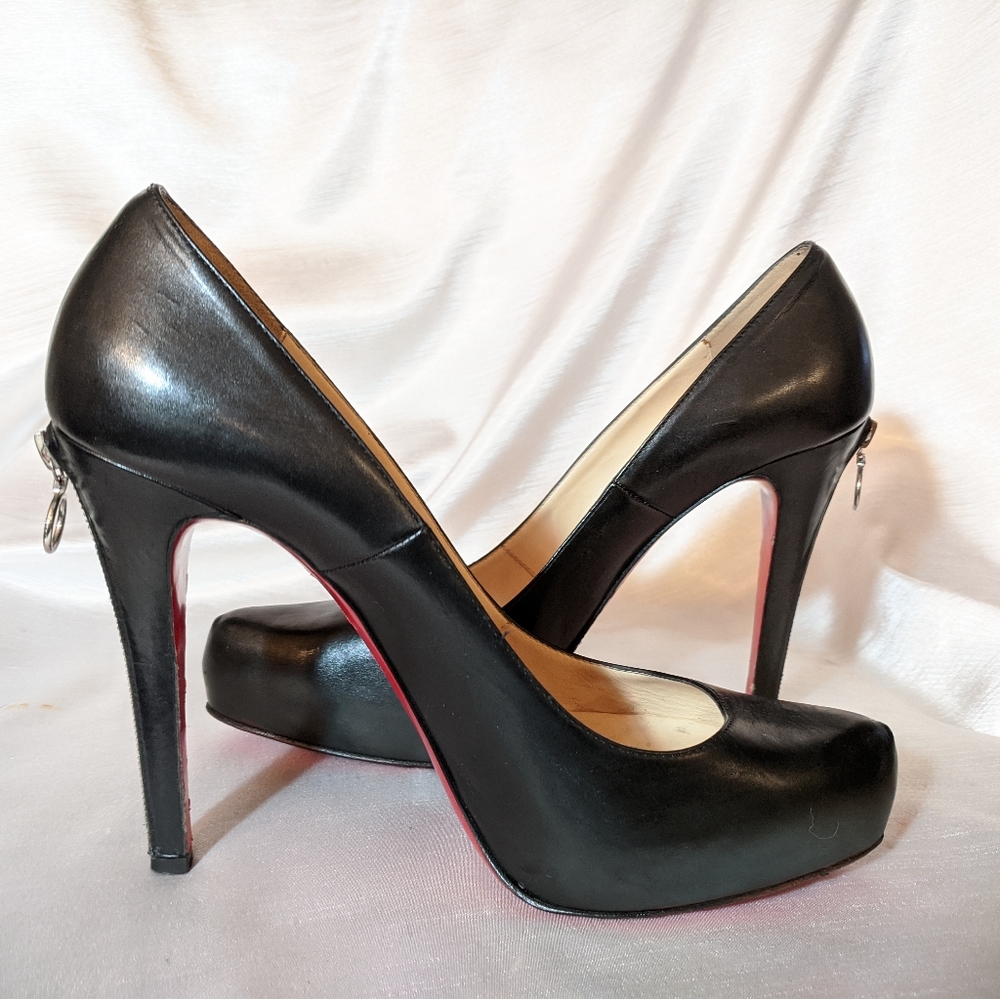 Christian Louboutin Black Platform heels. US 8.5